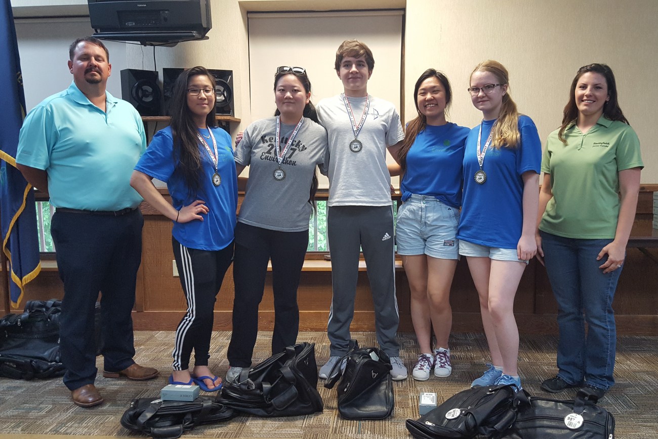 Left to right: Jeremy Roy of the Kentucky Farm Bureau Federation poses with Paul Larence Dunbar Team B, Hannah Wang, Cici Mao , Zsomber Gal, Kelly Chen, Reka Gal and Dorothy Anglin of Smithfield Foods.  Photo by Dale Booth.