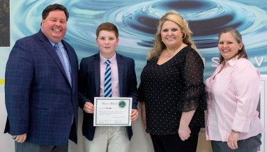 Cam Lich receives his award.