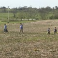 A family picks a spot to plant at Josephine Sculpture Park.