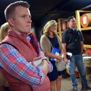 Ideas are exchanged at the summit that takes place on distillery grounds.