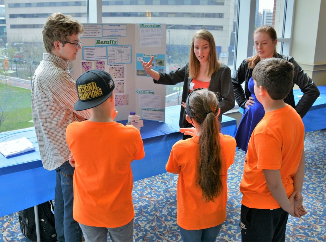 Mercer County Senior High School student explain their Kentucky Green and Healthy Schools water quality project to students from White_s Tower Elementary School.