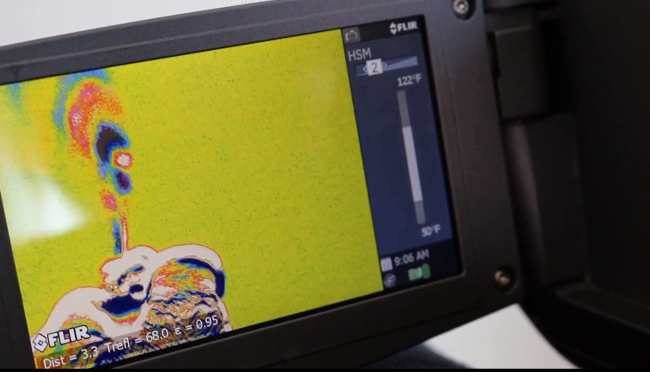 The fumes from a lighter are demonstrated on the FLIR camera.