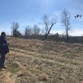 Ben Enzweiler manually lands the drone at a site.