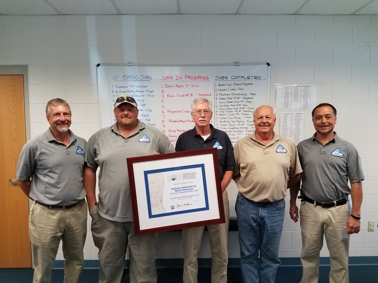 Hazard AML Emergency Branch Employees involved in the Joan Bernat Slide. From left to right: Wally Barger, Environmental Control Manager, Duane Bates, Environmental Scientist, Ray Shepherd, Environmental Scientist, Charles Booth, Environmental Scientist, Jim Cable, Environmental Control Supervisor.