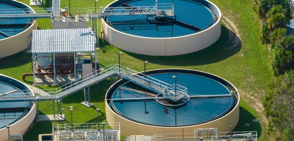 aerial view of water tanks at a treatment factory.